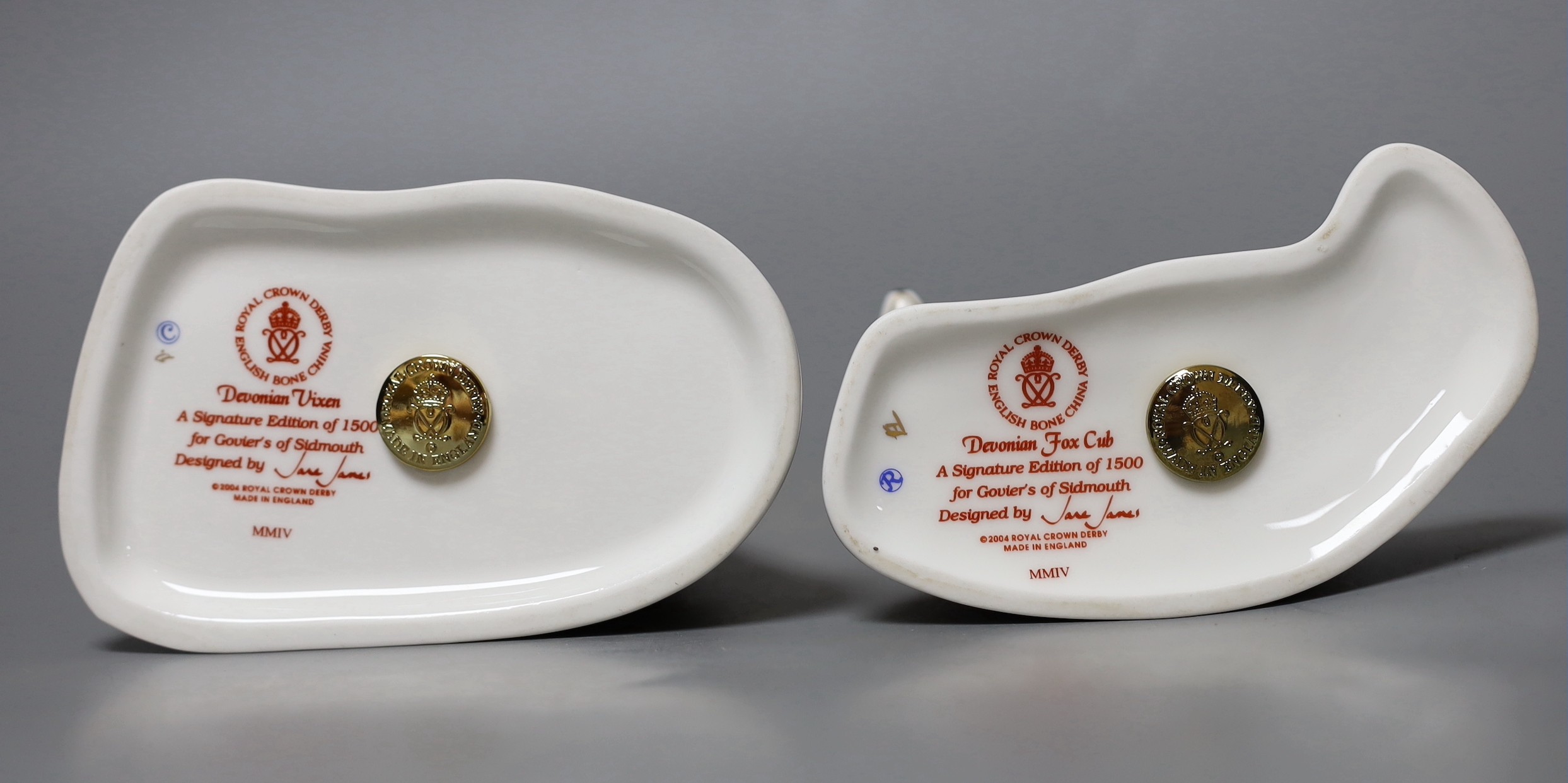Two Royal Crown Derby paperweights - Devonian Vixen, gold stopper, boxed with certificate and Devonian Fox Cub, gold stopper, boxed with certificate